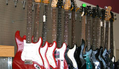 Guitars and other musical instruments at Top Cash Pawn and Loan Guitars and other musical instruments at Top Cash Pawn and Loan